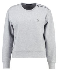Grau Sweatshirt aus weichem Stoff, mit Rundhalsausschnitt, langen Ärmeln, seitlichen Reißverschlüssen und einem kleinen Logo auf der Brust.
