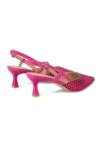 Pink suede slingback heels with a pointed toe, adorned with shine accents and a block heel. Features an adjustable strap for fit.