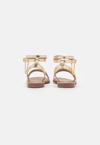 ONLY SHOES Varrelliset sandaalit - gold-coloured