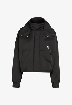 Black cropped jacket made from smooth, lightweight fabric. Features a high collar, two front zip pockets, and a logo on the left side.