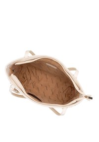 Borsa color crema con un esterno liscio e strutturato. L'interno presenta una fodera beige con un motivo ripetuto "WITTCHEN" e una tasca con zip.