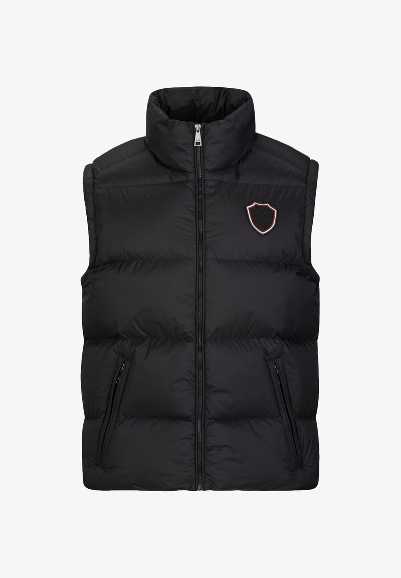 Schwarze gepolsterte Weste mit hohem Kragen, durchgehendem Reißverschluss und zwei Taschen an den Seiten. Mit einem Wappenemblem in rot, grün und weißer Stickerei.