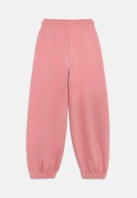 Calvin Klein Jeans LOGO JOGGER - Treniņtērpa apakšdaļas - brandied apricot