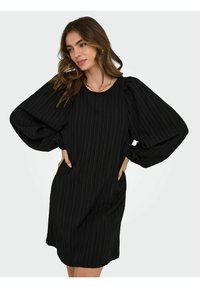 Black dress with vertical stripes, puffed long sleeves, round neckline, and pockets. Soft texture with a relaxed fit.