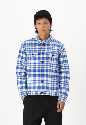 Blauw en wit geruite hemdenjasje met kraag, knoopsluiting aan de voorkant en twee borstzakken. Gemaakt van stof met een gestructureerd gevoel.