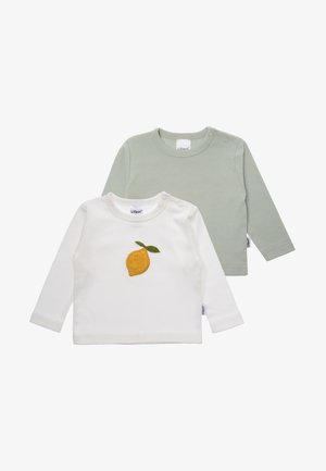 Zwei Langarm-Babyshirts: eines in Weiß mit gelber Zitronenstickerei und grünem Blatt, das andere einfarbig blassgrün, beide aus weichem Stoff.