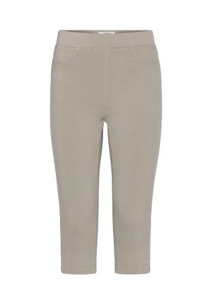 Pantalones beige ajustados y recortados con cintura elástica, bolsillos delanteros falsos y costuras visibles sobre un fondo blanco.