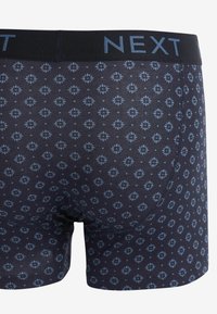 Next 4 PACK - Trunks - dark blue geo pattern