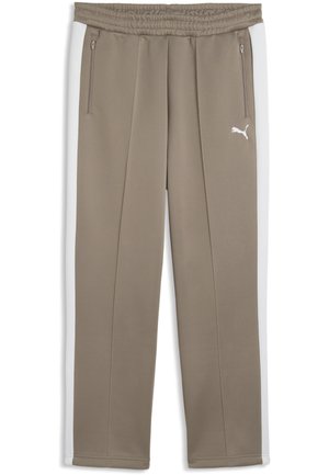 Taupe sportowe spodnie z elastycznym pasem, przednimi kieszeniami na zamek, białymi pasami po bokach i białym logo Puma na lewej górnej części nogawki.