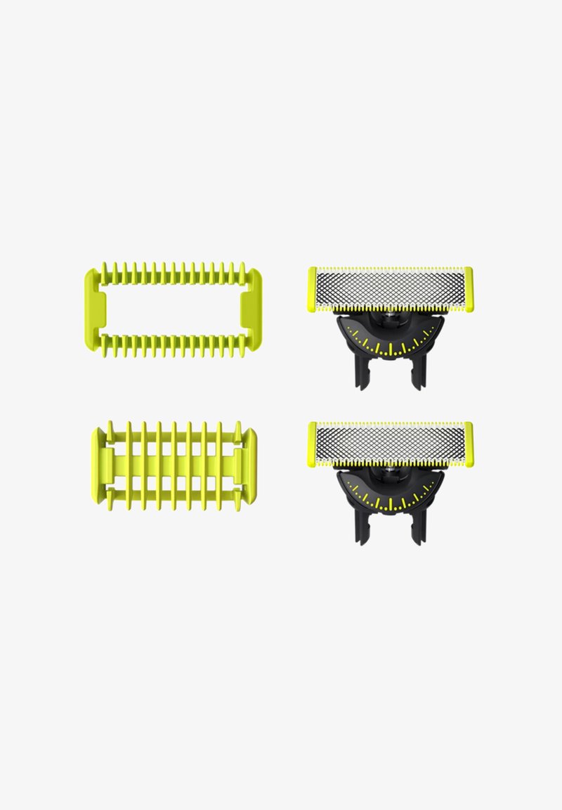 Les accessoires de toilettage en plastique vert présentent des designs de peigne et de protection. Comprend des têtes de rasoir recouvertes de mailles avec des bases noires, marquées d'indicateurs de mesure.