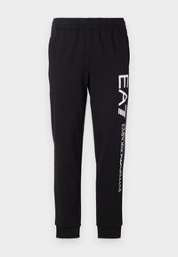 TROUSER - Tracksuit bottoms - black/white