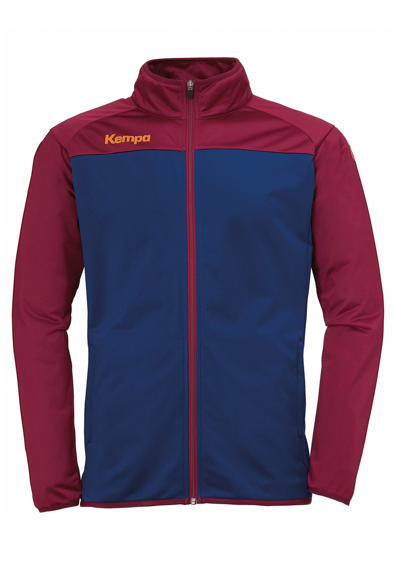 Rote und blaue Zip-Jacke aus glattem Stoff mit hohem Kragen, langen Ärmeln und "Kempa"-Logo auf der Brust.