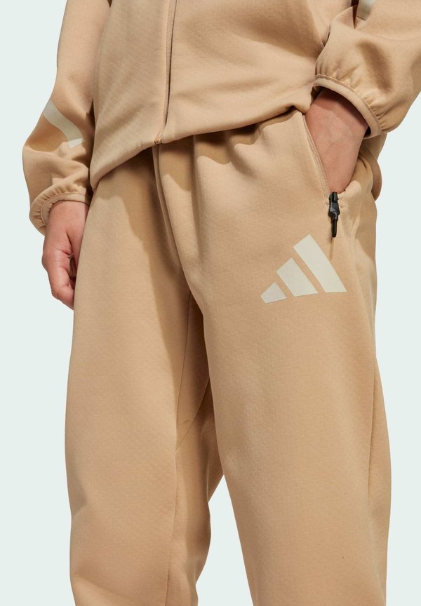 JUNIOR - Tracksuit bottoms - warm sandstone beige2