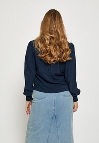 Minus ANINE V-NECK  - Blouse - sky captain