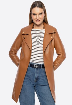 Brown leather jacket with an asymmetrical zipper, notch collar, and long sleeves. Worn over a striped shirt and blue jeans.