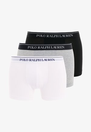 Trois paires de boxers briefs en blanc, gris et noir. Chaque paire est équipée d'une ceinture élastique contrastante avec l’inscription "POLO RALPH LAUREN".