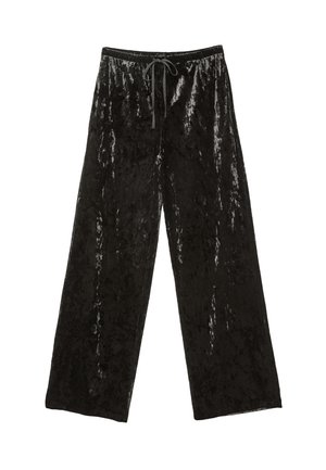 Črne žametne hlače širokega kroja z gladko teksturo in elastičnim pasom. Imajo vrvico za prilagodljivo prileganje.