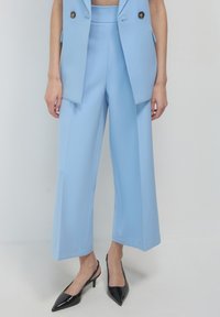 PALAZZO  - Trousers - celeste medio