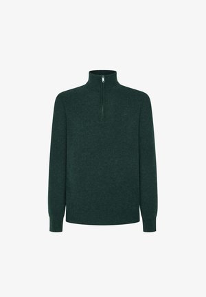 Sudadera de cuello alto en verde oscuro con cremallera de un cuarto y mangas largas, hecha de un material de punto suave. Presenta un cuello alto y puños y dobladillo con canalé.