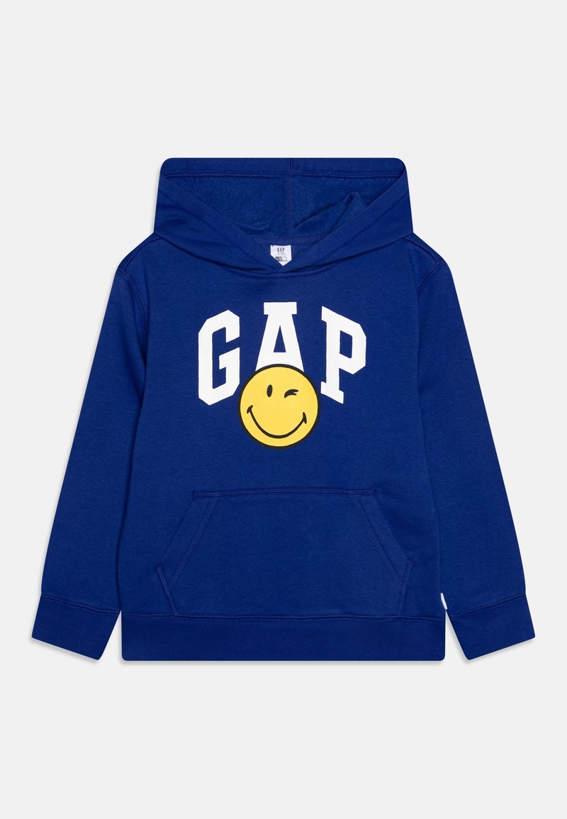 Sweat à capuche bleu pour enfants avec poche avant, texte "GAP" blanc, et logo visage souriant jaune faisant un clin d'œil sur la poitrine.