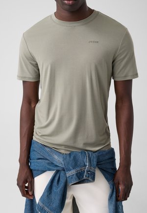 Guess, BESTICKTES LOGO-T-SHIRT - T-shirt basique - grün