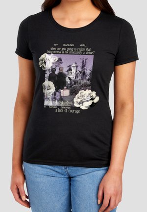 Black t-shirt with vintage-style graphic of two people with luggage facing a large house, white flowers, and text about normality and courage.