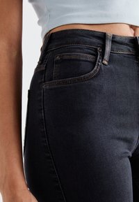 Lee BREESE - Flared jeans - washed black