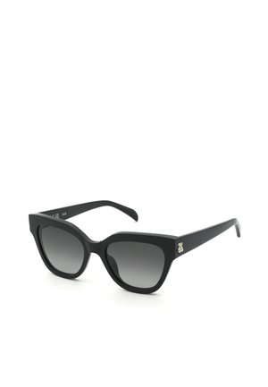 Lunettes de soleil œil de chat noires avec verres à dégradé foncé et petits clous décoratifs argentés sur les branches.