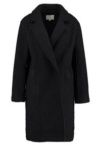 Černý dlouhý kabát z texturované tkaniny se šálovým límcem, bočními kapsami a rovnou siluetou. Žádná viditelná zapínání.