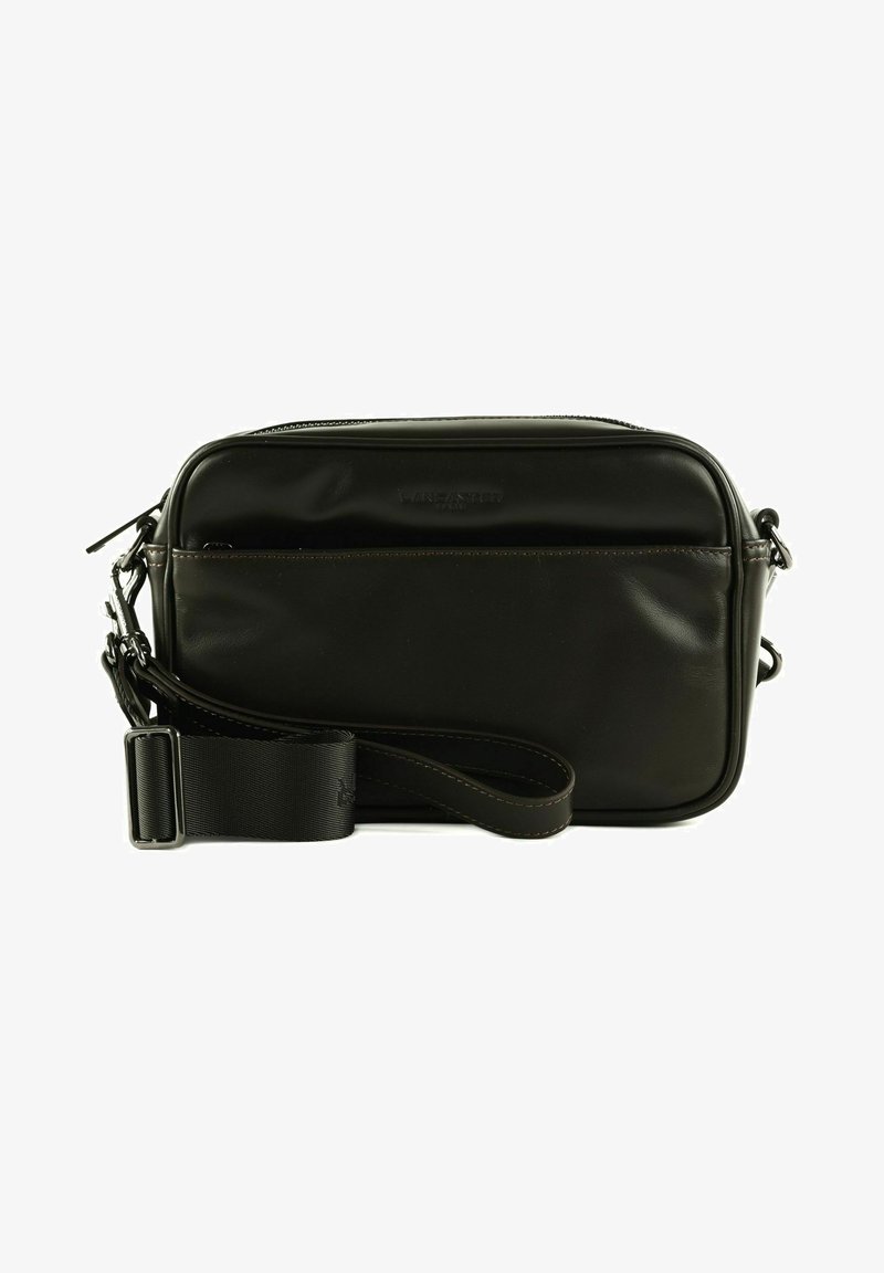 Sac en cuir noir bandoulière de forme rectangulaire, avec fermeture zippée, poche avant et bandoulière réglable. Texture lisse et design minimaliste.