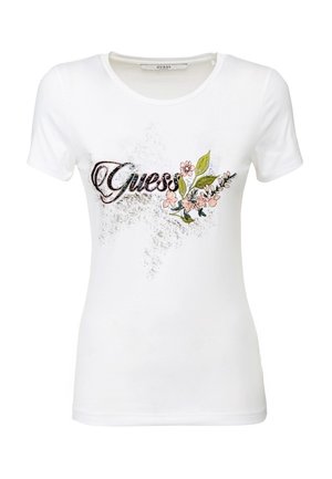 Biała damska koszulka z krótkim rękawem z logo "Guess", z wyblakłym tłem w gwiazdy oraz wyszywanymi różowymi kwiatami i zielonymi liśćmi na piersi.