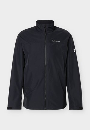 Chaqueta ligera negra con cremallera completa en el frente, cuello alto y logo blanco "Peak Performance" en el pecho y el brazo.