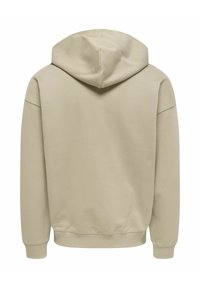 Bēšā krāsas sporta krekls ar kapuci un vienkāršu dizainu. Tam ir ribotās aproces un apakšmala, tīras līnijas un mīksts, faktūrēts materiāls.