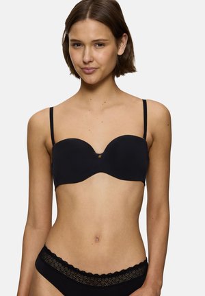 Schwarzer gepolsterter BH mit verstellbaren Trägern, nahtlosem Design, weichem Material und einem dezenten goldenen Akzent in der Mitte.