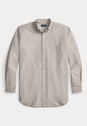 Lichtgrijs overhemd met lange mouwen, knopen, kraag en klein geborduurd Polo Ralph Lauren-logo op de linkerborst.
