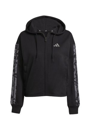 Sweat à capuche noir zippé avec une capuche doublée, des manches grises à motifs et un logo Adidas sur la poitrine. Confectionné en tissu doux et texturé.