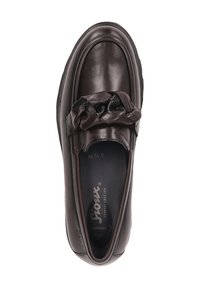 Braune Leder-Slipper mit runder Zehenform, die ein dekoratives Knotendetail im Obermaterial aufweisen. Glatte Textur und gepolsterte Innensohle.