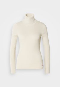 Kremasta jopica s turtleneck ovratnikom, izdelana iz rebraste tkanine. Ima dolge rokave, prilegan obliko in majhen logotip na robu. Mehka tekstura.