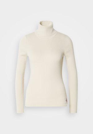 Cremfarbener Rollkragenpullover aus geripptem Stoff. Hat lange Ärmel, eine taillierte Passform und ein kleines Logo am Saum. Weiche Textur.