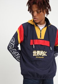 Cayler & Sons WINDBREAKER - Cortaviento - navy/yellow