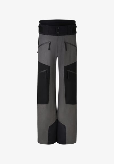 Grijze skibroek met zwarte accenten, voorzien van meerdere zakken met rits, een brede tailleband en een loszittend ontwerp voor bewegingsvrijheid.