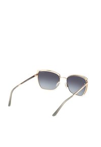 Occhiali da sole oversize con montatura in metallo dorato e lenti grigie sfumate. Presentano bordi curvi e sottili tempie grigie eleganti con naselli.