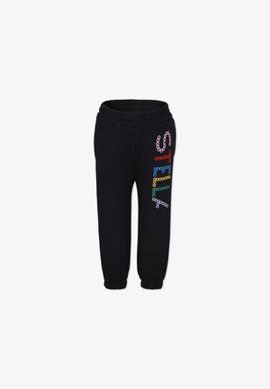 Pantaloni della tuta neri con un elastico in vita. "STIL" stampato in motivi circolari multicolori lungo il lato sinistro. Polsini aderenti alle caviglie.