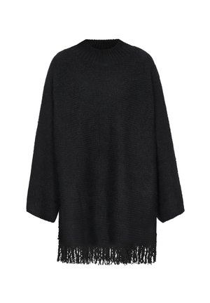 Zwarte oversized trui met een ronde hals, textuur gebreide stof en franjes aan de onderkant. Heeft driekwart mouwen.
