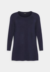 Marineblauw langdetailed shirt van zachte stof. Heeft een ronde halslijn en een ontspannen pasvorm, met ribbelaccenten op de mouwen.