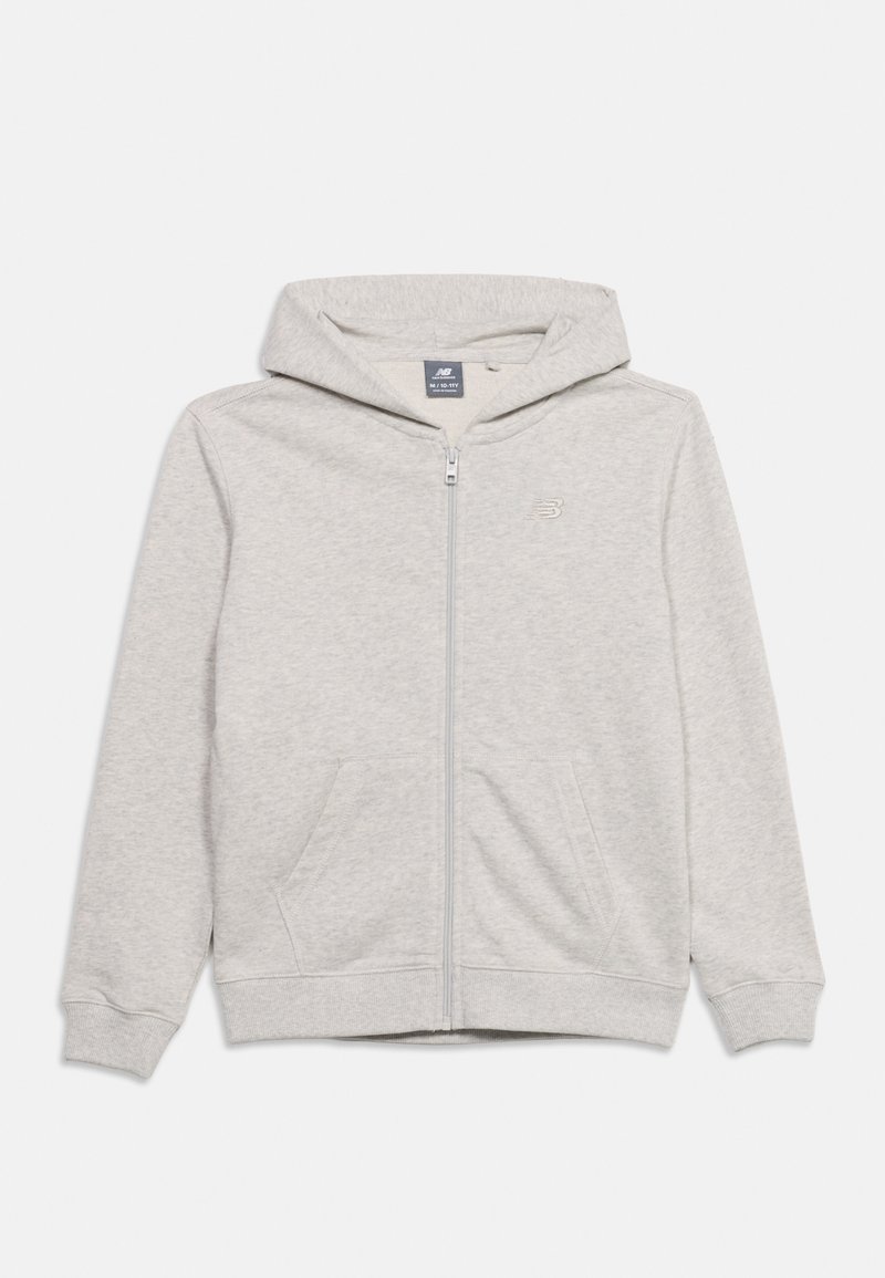 Sweat à capuche zippé gris clair avec poches avant, manches longues et petit logo sur la poitrine, posé à plat sur fond blanc.