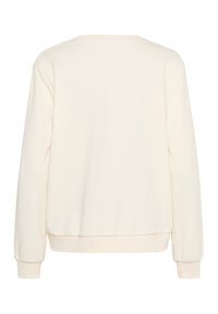 Sweatshirt à manches longues couleur crème en coton doux, avec un col arrondi, des poignets et un ourlet côtelés. Design uni sans motifs ni accents.