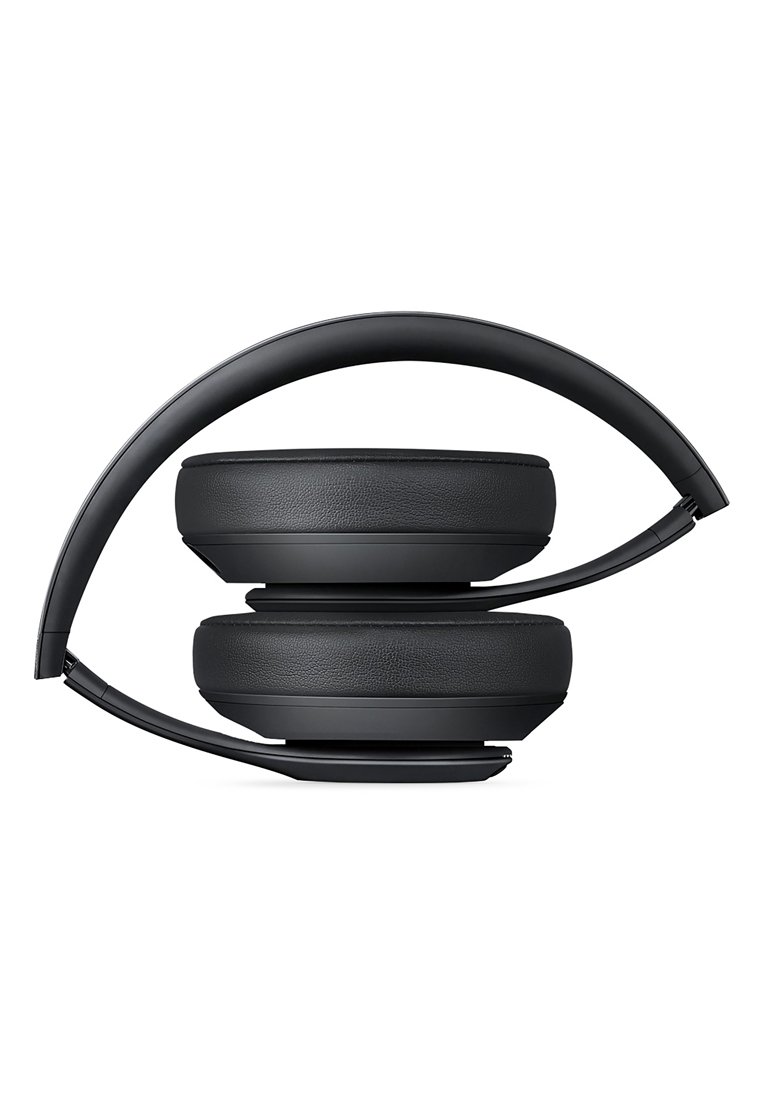Czarne nauszne słuchawki z zakrzywionym metalowym pałąkiem, teksturowanymi poduszkami na uszy oraz składanym designem umożliwiającym kompaktowe przechowywanie.