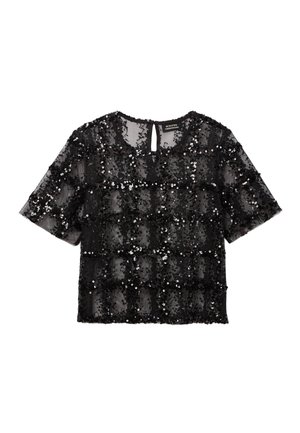 Haut noir à manches courtes en tissu transparent avec des ornements en sequins formant un motif en damier. Dispose d'un col rond et d'une ouverture en forme de goutte au dos.