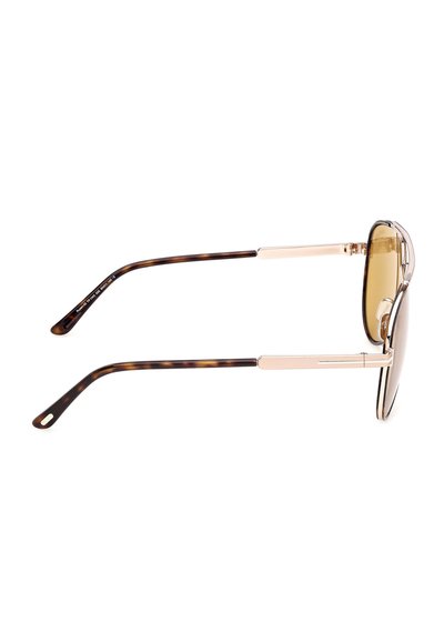 Gouden aviator-zonnebril met metalen frame, bruine gradientlenzen en pootjes met schildpadmotief, zijaanzicht.